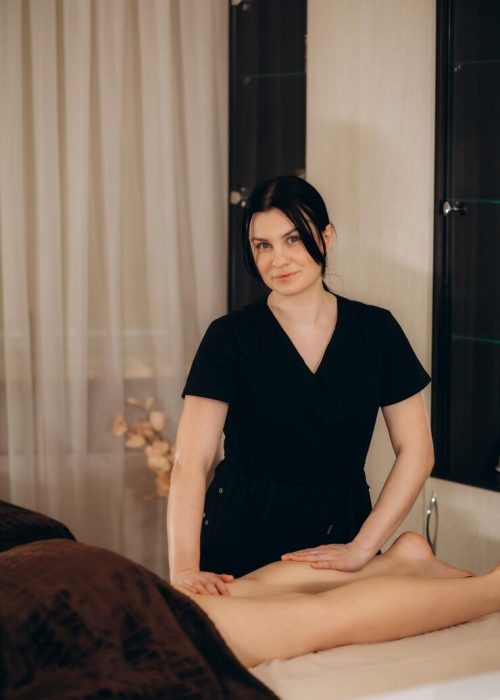 professional-caucasian-specialist-is-doing-leg-message-modern-minimalistic-salon_633611-11405.jpg